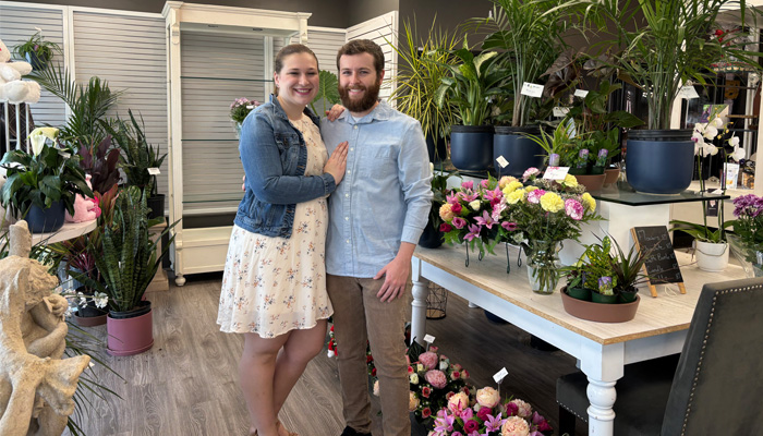 Owners of Cornwall Flowers in their store
